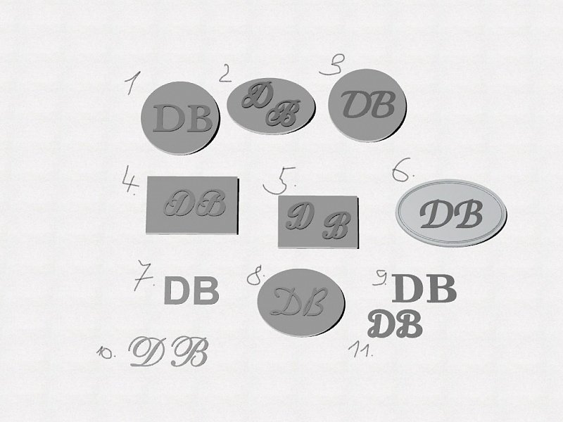 Set manžetových knoflíčků a spon na kravatu s rytinou monogramu DB vyrobené na zakázku
